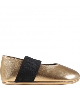 Gold ballet flats for baby girl with logo