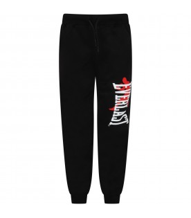 Black sweatpants for boy with white logo and red boxer