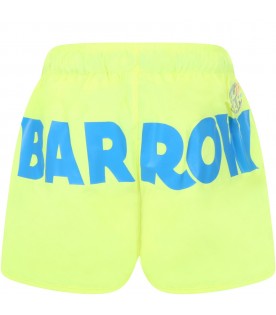 Neon yellow swimshort for boy with smile