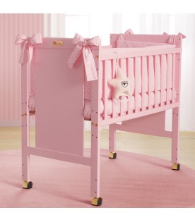 Pink Mini-me crib for baby girl with logo