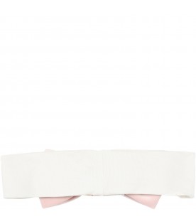 White headband decorated with pink velvet bow on the front.