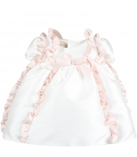 White dress for baby girl with ruffles and bows