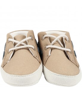 Brown sneakers for baby boy with blue logo